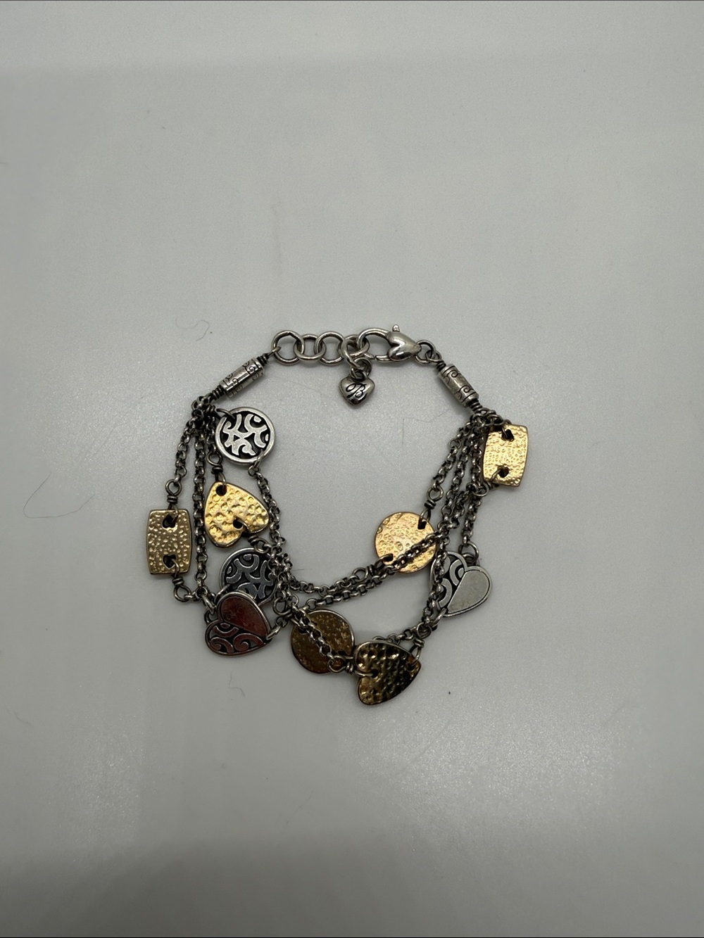 Multi-Tone Heart & Disc Charm Bracelet - Gold and Silver by Brighton